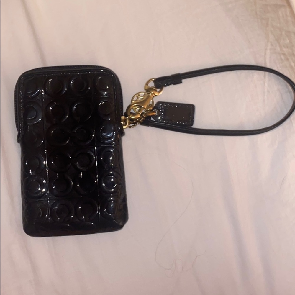 Coach clutch/universal case